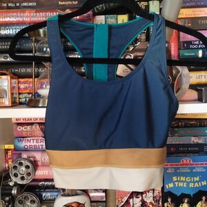 Nani Swimwear blue, teal, and beige color-blocked swim top